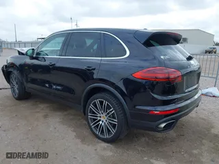 2017 Porsche Cayenne with VIN WP1AA2A2XHKA90706, listed as a IAAI auction lot 41692768 with 92,800 mi miles. Bid and sale history available at carsss.com. Image 3.