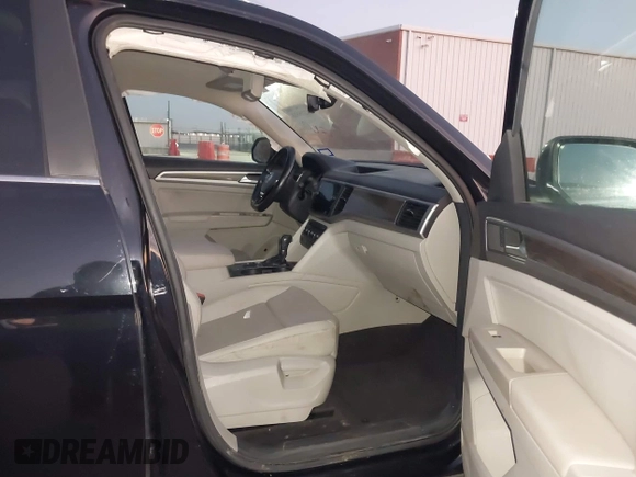 2018 Volkswagen Atlas SE with VIN 1V2DR2CA8JC536295, listed as a IAAI auction lot 41275322 with 166,684 mi miles and . Bid and sale history available at DreamBid. Image 5.