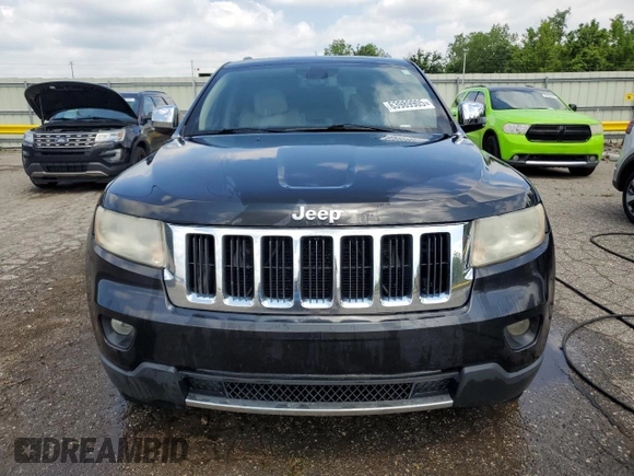 2011 Jeep Grand Cherokee Limited with VIN 1J4RR5GT4BC619724, listed as a Copart auction lot 63989905 with 212,198 mi miles and Clean title. Bid and sale history available at DreamBid. Image 5.