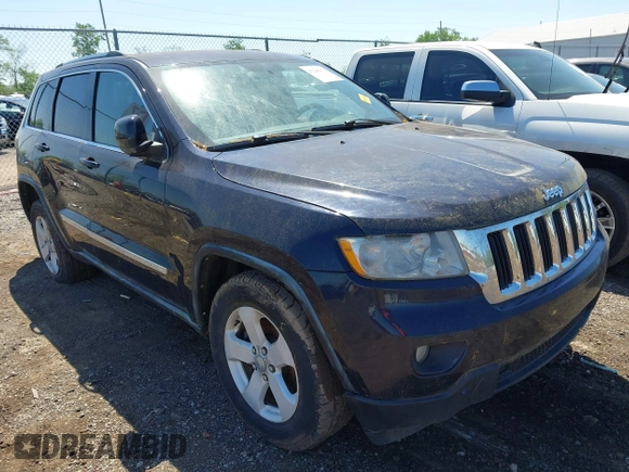 2011 Jeep Grand Cherokee Laredo with VIN 1J4RR4GG8BC525701, listed as a IAAI auction lot 42240431 with 198,921 mi miles and . Bid and sale history available at DreamBid. Image 1.