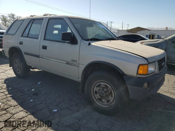 1997 Isuzu Rodeo z VIN 4S2CK58EXV4301951, wystawiony jako Copart lot #67468714 z przebiegiem 234 738 mil mil oraz Czysty tytuł • Clean title. Historia ofert i sprzedaży dostępna na DreamBid. Obrazek 4.