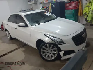 2015 Cadillac CTS Luxury AWD with VIN 1G6AX5SX5F0117267, listed as a IAAI auction lot 41762217 with 79,930 mi miles and . Bid and sale history available at DreamBid. Image 1.