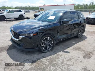2023 Mazda CX-5 2.5 S Premium Plus Package with VIN JM3KFBEM5P0256652, listed as a IAAI auction lot 41936376 with 31,332 mi miles. Bid and sale history available at carsss.com. Image 17.
