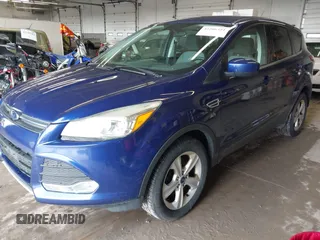 2016 Ford Escape SE with VIN 1FMCU9GX2GUA80134, listed as a IAAI auction lot 42206351 with 129,885 mi miles and . Bid and sale history available at DreamBid. Image 2.