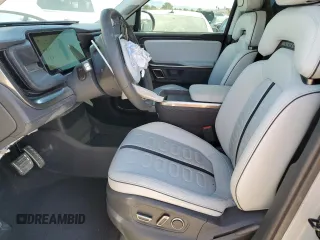 2023 Rivian R1S Adventure z VIN 7PDSGABA1PN021963, wystawiony jako Copart lot #43451105 z przebiegiem 165 mil mil oraz Szkody całkowita. Historia ofert i sprzedaży dostępna na DreamBid. Obrazek 7.