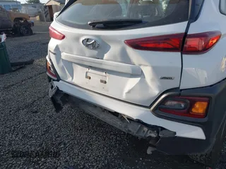 2018 Hyundai Kona SE with VIN KM8K1CAA3JU094976, listed as a IAAI auction lot 40796987 with 128,592 mi miles. Bid and sale history available at carsss.com. Image 18.