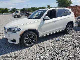 2014 BMW X5 xDrive50i with VIN 5UXKR6C50E0J71748, listed as a Copart auction lot 51114095 with 89,650 mi miles and Clean Title. Bid and sale history available at carsss.com. Image 1.