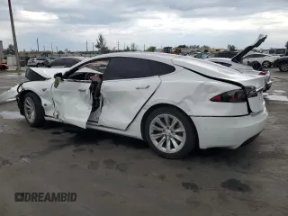 2016 Tesla Model S 70 with VIN 5YJSA1E10GF153812, listed as a Copart auction lot 52108565 with 90,938 mi miles and Non Repairable. Bid and sale history available at DreamBid. Image 2.