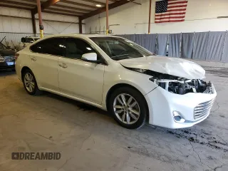 2015 Toyota Avalon Limited with VIN 4T1BK1EB9FU186136, listed as a Copart auction lot 50009945 with 106,206 mi miles and Salvage Title. Bid and sale history available at DreamBid. Image 4.