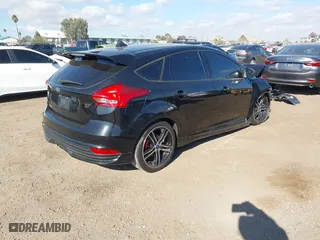 2015 Ford Focus ST with VIN 1FADP3L96FL221639, listed as a IAAI auction lot 41342369 with 110,267 mi miles. Bid and sale history available at carsss.com. Image 4.