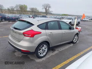 2015 Ford Focus SE with VIN 1FADP3K21FL211511, listed as a IAAI auction lot 42153828 with 126,111 mi miles. Bid and sale history available at carsss.com. Image 4.