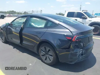 2025 Tesla Model 3 Long Range with VIN 5YJ3E1EA0SF903825, listed as a IAAI auction lot 42197820 with 4,944 mi miles and . Bid and sale history available at DreamBid. Image 3.