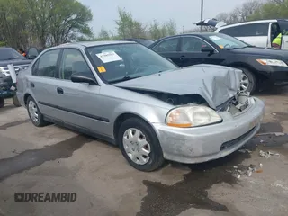 1998 Honda Civic LX z VIN 1HGEJ6678WL012707, wystawiony jako IAAI lot #41985587 z przebiegiem 242 740 mil mil oraz . Historia ofert i sprzedaży dostępna na DreamBid. Obrazek 1.