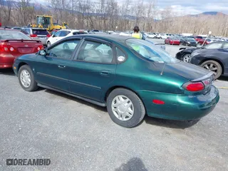 1999 Ford Taurus SE with VIN 1FAFP53S5XA102534, listed as a IAAI auction lot 41740212 with 154,926 mi miles. Bid and sale history available at carsss.com. Image 3.