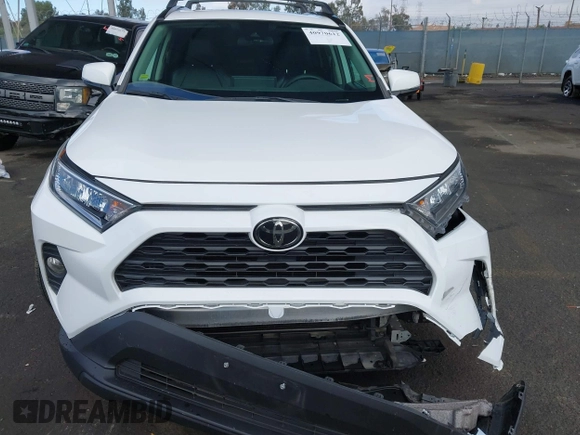 2019 Toyota RAV4 XLE with VIN 2T3W1RFV5KW051023, listed as a IAAI auction lot 40970612 with 106,359 mi miles and . Bid and sale history available at DreamBid. Image 11.