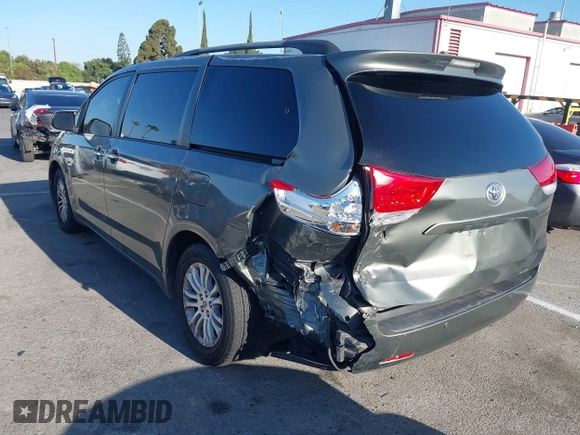 2011 Toyota Sienna XLE AAS with VIN 5TDYK3DC6BS072856, listed as a IAAI auction lot 42684298 with 113,202 mi miles and . Bid and sale history available at DreamBid. Image 3.