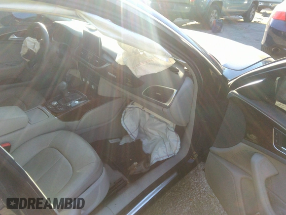 2014 Audi A6 Premium Plus z VIN WAUGFAFC7EN042581, wystawiony jako IAAI lot #34712557 z przebiegiem Nie podano mil oraz . Historia ofert i sprzedaży dostępna na DreamBid. Obrazek 5.