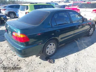 1999 Honda Civic VP with VIN 2HGEJ6616XH515145, listed as a IAAI auction lot 41299003 with 209,375 mi miles. Bid and sale history available at carsss.com. Image 4.