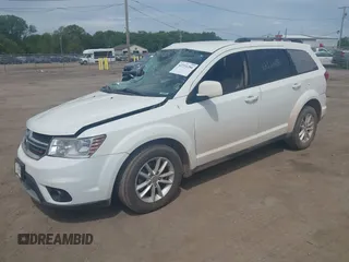 2017 Dodge Journey SXT z VIN 3C4PDCBG8HT534473, wystawiony jako IAAI lot #42351286 z przebiegiem 127 917 mil mil oraz . Historia ofert i sprzedaży dostępna na DreamBid. Obrazek 2.