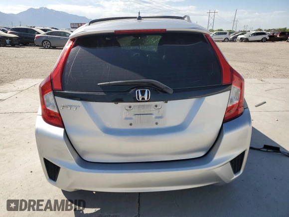 2016 Honda Fit LX with VIN JHMGK5H5XGX020620, listed as a Copart auction lot 60337295 with 103,827 mi miles and Salvage title. Bid and sale history available at DreamBid. Image 6.