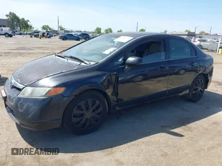 2007 Honda Civic Sdn LX with VIN 1HGFA16507L126952, listed as a IAAI auction lot 42104129 with 182,111 mi miles. Bid and sale history available at carsss.com. Image 2.
