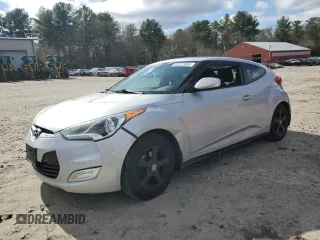 2013 Hyundai Veloster w/Black Int z VIN KMHTC6AD6DU121277, wystawiony jako Copart lot #53222805 z przebiegiem 155 236 mil mil oraz Czysty tytuł • Clean title. Historia ofert i sprzedaży dostępna na DreamBid. Obrazek 1.
