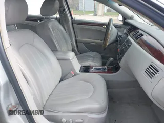 2009 Buick Lucerne CXL with VIN 1G4HD57M79U141033, listed as a IAAI auction lot 42061042 with 161,021 mi miles. Bid and sale history available at carsss.com. Image 5.