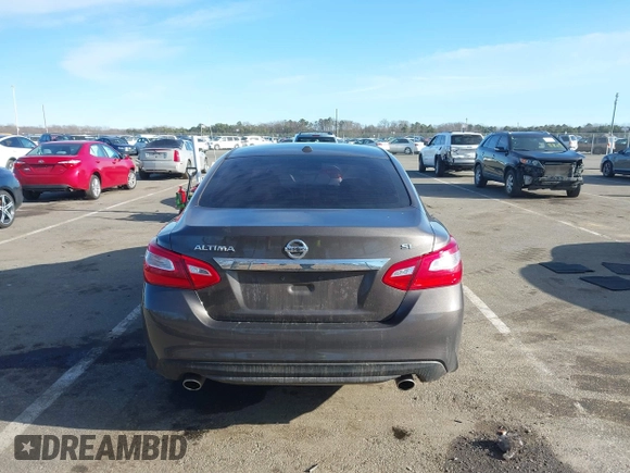 2017 Nissan Altima SR z VIN 1N4AL3AP9HC133798, wystawiony jako IAAI lot #41582890 z przebiegiem 57 440 mil mil oraz . Historia ofert i sprzedaży dostępna na DreamBid. Obrazek 16.
