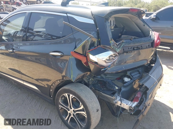 2018 Chevrolet Bolt EV Premier with VIN 1G1FX6S04J4116505, listed as a IAAI auction lot 42258808 with 103,089 mi miles and . Bid and sale history available at DreamBid. Image 6.