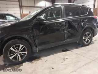 2017 Toyota RAV4 XLE with VIN 2T3RFREV0HW669312, listed as a IAAI auction lot 41410721 with 99,404 mi miles. Bid and sale history available at carsss.com. Image 6.