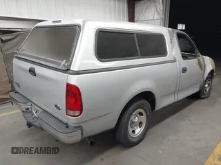 2004 Ford F-150 XL with VIN 2FTRF172X4CA52298, listed as a IAAI auction lot 42278927 with Not provided miles and . Bid and sale history available at DreamBid. Image 4.