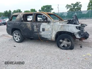 2015 Chevrolet Tahoe LTZ with VIN 1GNSKCKC9FR524268, listed as a IAAI auction lot 42419934 with Not provided miles and . Bid and sale history available at DreamBid. Image 1.