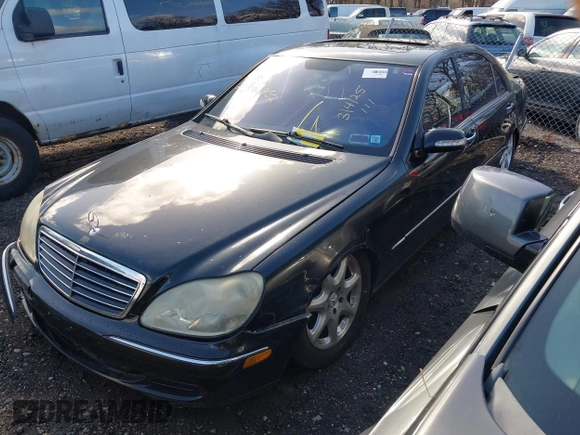 2004 Mercedes-Benz S-Class 5.0L with VIN WDBNG84J44A427425, listed as a IAAI auction lot 41851176 with 999,999 mi miles. Bid and sale history available at carsss.com. Image 2.