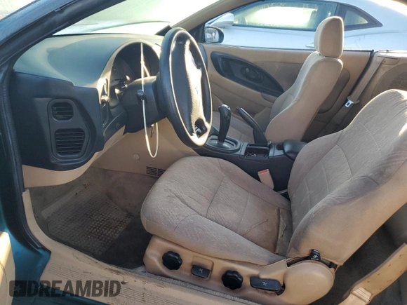 1999 Mitsubishi Eclipse GS with VIN 4A3AX35G2XE134039, listed as a Copart auction lot 76186224 with 0 mi miles and Salvage Title. Bid and sale history available at carsss.com. Image 7.