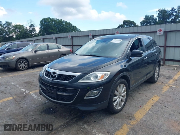 2010 Mazda CX-9 Grand Touring with VIN JM3TB2MA3A0201602, listed as a IAAI auction lot 42463599 with 331,533 mi miles and . Bid and sale history available at DreamBid. Image 2.