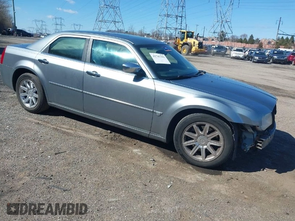 2006 Chrysler 300 C with VIN 2C3KA63HX6H518989, listed as a IAAI auction lot 41741341 with 134,636 mi miles. Bid and sale history available at carsss.com. Image 1.