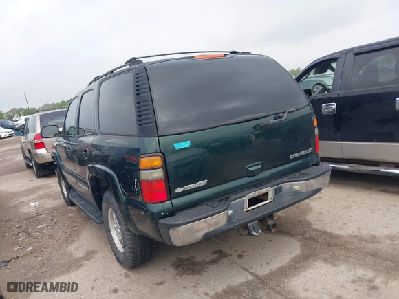 2003 Chevrolet Tahoe LT with VIN 1GNEC13Z03R268258, listed as a IAAI auction lot 41916956 with 218,720 mi miles. Bid and sale history available at carsss.com. Image 3.