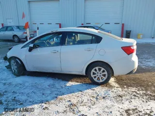 2014 Kia Rio LX with VIN KNADM4A39E6415521, listed as a IAAI auction lot 41411105 with 134,882 mi miles. Bid and sale history available at carsss.com. Image 15.