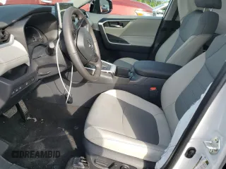2024 Toyota RAV4 Hybrid XLE Premium with VIN 4T3B6RFV1RU174487, listed as a Copart auction lot 57208645 with 9,911 mi miles and Salvage title. Bid and sale history available at DreamBid. Image 7.