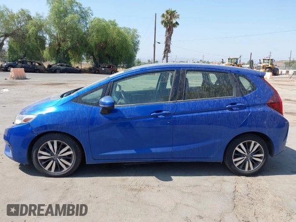 2015 Honda Fit EX-L z VIN 3HGGK5H85FM730218, wystawiony jako IAAI lot #42818190 z przebiegiem 153 822 mil mil oraz . Historia ofert i sprzedaży dostępna na DreamBid. Obrazek 14.