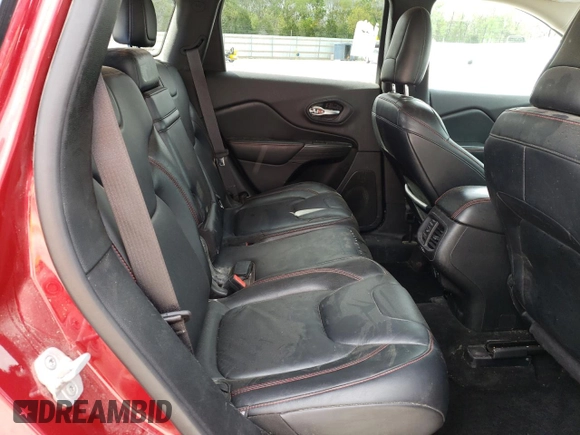 2014 Jeep Cherokee Trailhawk z VIN 1C4PJMBS2EW100476, wystawiony jako Copart lot #55130035 z przebiegiem 136 943 mil mil oraz Szkoda całkowita • Salvage title. Historia ofert i sprzedaży dostępna na DreamBid. Obrazek 11.