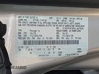 2014 Ford Focus SE with VIN 1FADP3F20EL427620, listed as a IAAI auction lot 41774994 with 60,080 mi miles and . Bid and sale history available at DreamBid. Image 9.
