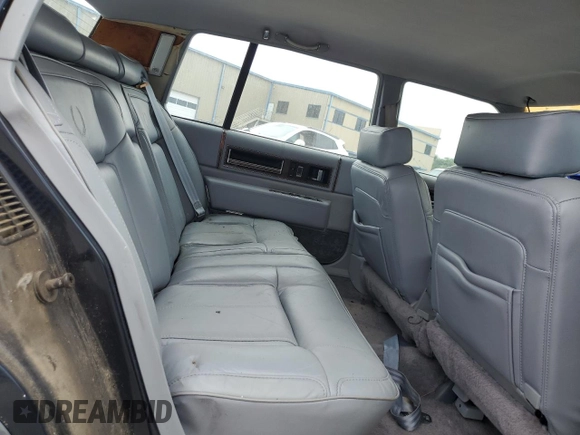 1990 Cadillac DeVille z VIN 1G6CD5337L4238206, wystawiony jako Copart lot #58214584 z przebiegiem Nie podano mil oraz Szkoda całkowita • Salvage title. Historia ofert i sprzedaży dostępna na DreamBid. Obrazek 10.
