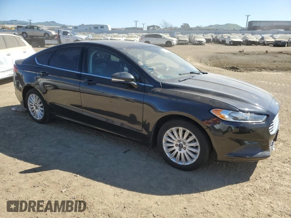 2015 Ford Fusion SE Hybrid with VIN 3FA6P0LU9FR225620, listed as a Copart auction lot 48308475 with Not Provided miles and Salvage Title. Bid and sale history available at DreamBid. Image 4.