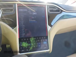 2014 Tesla Model S 60 with VIN 5YJSA1H17EFP33275, listed as a IAAI auction lot 41778167 with 202,749 mi miles and . Bid and sale history available at DreamBid. Image 18.