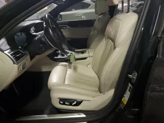 2017 BMW 7 Series with VIN WBA7F2C34HG423291, listed as a Copart auction lot 42914665 with 61,113 mi miles and Salvage Title. Bid and sale history available at DreamBid. Image 7.