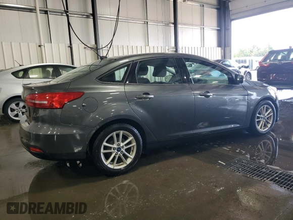 2017 Ford Focus SE with VIN 1FADP3F21HL205754, listed as a Copart auction lot 67166984 with 83,617 mi miles and Salvage title. Bid and sale history available at DreamBid. Image 3.