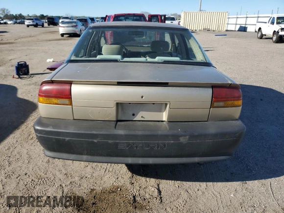 1995 Saturn SL with VIN 1G8ZH5288SZ350078, listed as a Copart auction lot 49236475 with 54,621 mi miles and Salvage title. Bid and sale history available at DreamBid. Image 6.