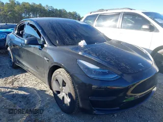 2022 Tesla Model 3 with VIN 5YJ3E1EA9NF147836, listed as a IAAI auction lot 41363603 with 28,748 mi miles. Bid and sale history available at carsss.com. Image 1.