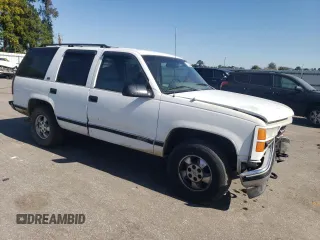 1996 GMC Yukon with VIN 1GKEK13R1TJ750705, listed as a Copart auction lot 76251474 with 245,084 mi miles and Salvage Title. Bid and sale history available at carsss.com. Image 4.